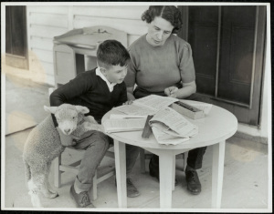 Close supervision by a mother of a young Blackfriars pupil with his pet. 15051_a047_003373 c. 01/01/1946 © State of New South Wales through the State Records Authority of NSW
